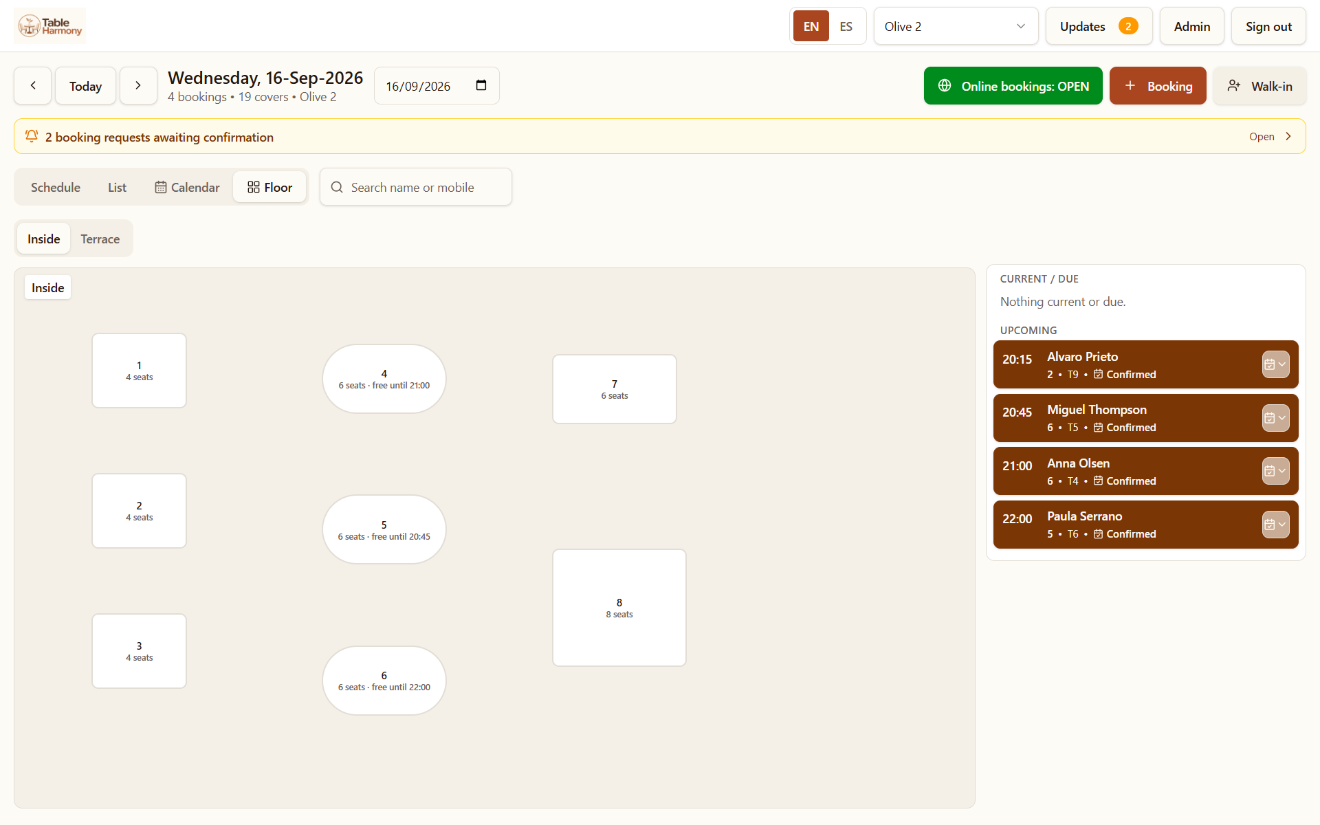 The floor view showing table layout with seats and the upcoming bookings list